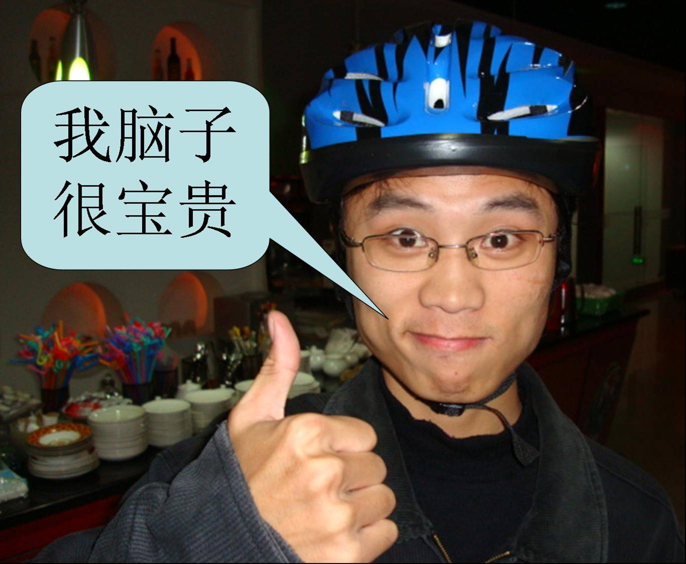 Picture:  Our poster boy for the Chinese bicycle helmet campaign.  In English he's saying: "My Brain is Precious".  